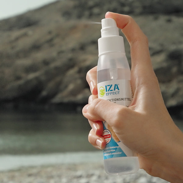 Iza Eccect Desinfektions Spray für die Füsse am Strand benutzen